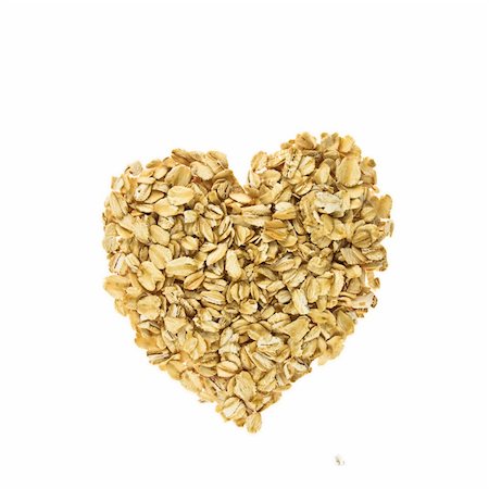 raw oats - Heart of oatmeal isolated on  white background Stock Photo - Budget Royalty-Free & Subscription, Code: 400-05688623