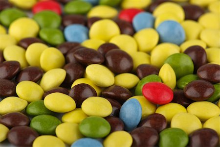 Many colourful halloween candy filling background. Fotografie stock - Microstock e Abbonamento, Codice: 400-05689335