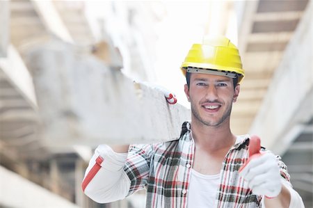 handsome hard worker people portrait at concstuction site Foto de stock - Super Valor sin royalties y Suscripción, Código: 400-05680115