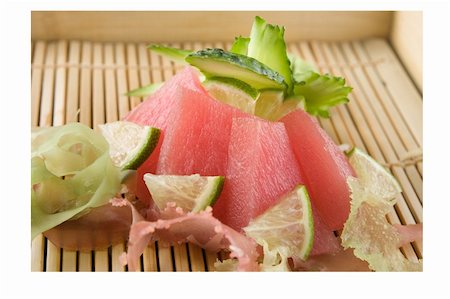 raw tuna decorated with cucumber and lime Stock Photo - Budget Royalty-Free & Subscription, Code: 400-05680183