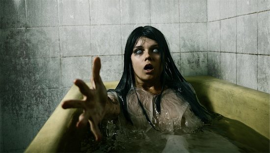 Scary girl in bath stretching her hand to camera, Halloween theme Photographie de stock - Libre de Droits (LD), Artiste: Elisanth, Le code de l’image : 400-05680464