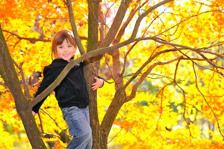 Little girl climbed on tree Stock Photo - Budget Royalty-Free & Subscription, Code: 400-05681152
