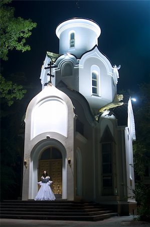 russia gold - Woman in white dress stay near the church. Russia (Vladivostok) Stock Photo - Budget Royalty-Free & Subscription, Code: 400-05681167