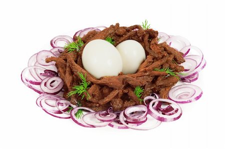 simsearch:400-05383364,k - Meat sticks decorated in the form of bird nests with two boiled eggs. Isolated on white Photographie de stock - Aubaine LD & Abonnement, Code: 400-05682275