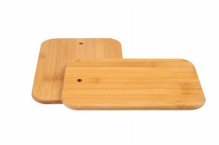 Wooden cutting board isolated on white background Stockbilder - Microstock & Abonnement, Bildnummer: 400-05682458