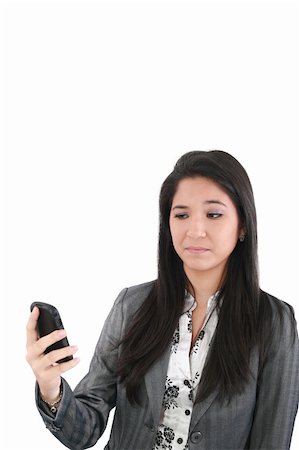 elegant asian woman reading - portrait of angry female looking at cellphone, isolated on white background Stock Photo - Budget Royalty-Free & Subscription, Code: 400-05683020