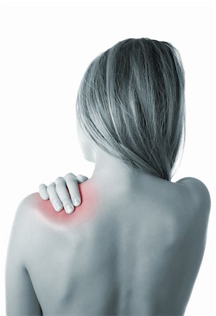 Woman pressing her hand against a painful shoulder Stock Photo - Budget Royalty-Free & Subscription, Code: 400-05683145