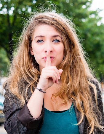 Portrait of a beautiful young fresh girl hushing Stock Photo - Budget Royalty-Free & Subscription, Code: 400-05683179