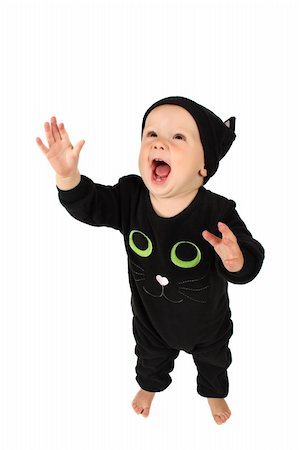 dressing up as a cat for halloween - Baby girl dressed in a halloween cat costume on white background Stock Photo - Budget Royalty-Free & Subscription, Code: 400-05683314