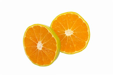 Two halves fresh orange on a white background Stock Photo - Budget Royalty-Free & Subscription, Code: 400-05683338