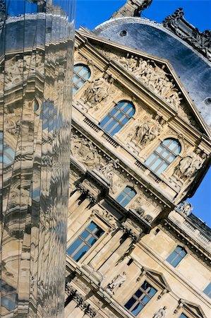 Louvre Pyramid on March 23, 2008 in Paris. Louvre is the biggest Museum in Paris displayed over 60,000 square meters of exhibition space. Stock Photo - Budget Royalty-Free & Subscription, Code: 400-05683926