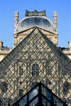 Louvre Pyramid on March 23, 2008 in Paris. Louvre is the biggest Museum in Paris displayed over 60,000 square meters of exhibition space. Stock Photo - Budget Royalty-Free & Subscription, Code: 400-05683927