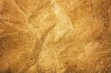 brown paper with bruises as an artistic background Stock Photo - Budget Royalty-Free & Subscription, Code: 400-05694322