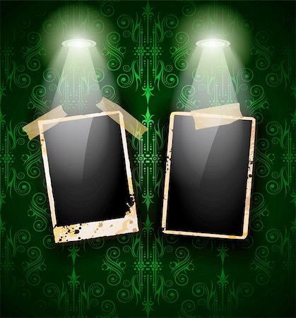 simsearch:400-05903130,k - Antique distressed photoframes with old dirty look on a vintage seamless wallpaper. Frames are featured by led spotlights.Shadows are transparent. Stock Photo - Budget Royalty-Free & Subscription, Code: 400-05694411