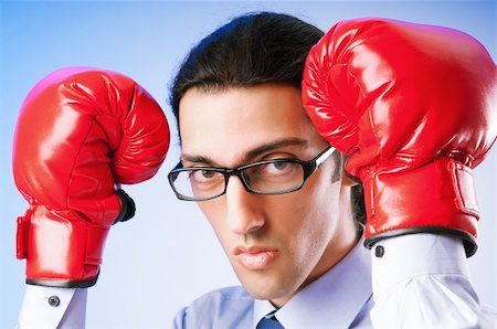 simsearch:400-05718453,k - Businessman with boxing gloves Stock Photo - Budget Royalty-Free & Subscription, Code: 400-05695416