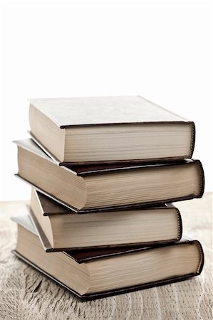 Stack of old hard cover leather bound books Stock Photo - Budget Royalty-Free & Subscription, Code: 400-05695702
