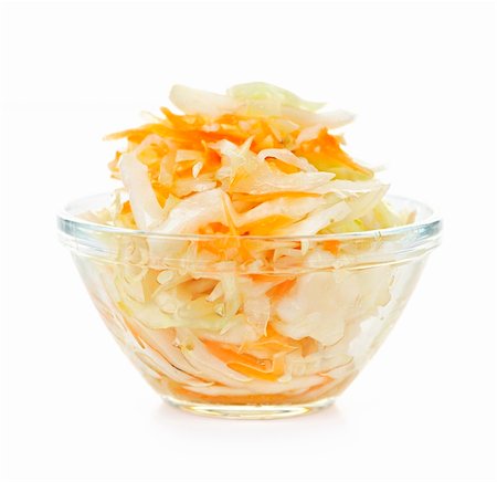 salada de repolho cru cortado fino - Coleslaw in glass bowl on white background Foto de stock - Royalty-Free Super Valor e Assinatura, Número: 400-05695739