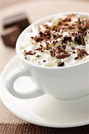 Cup of hot cocoa with shaved chocolate and whipped cream Stock Photo - Budget Royalty-Free & Subscription, Code: 400-05695733