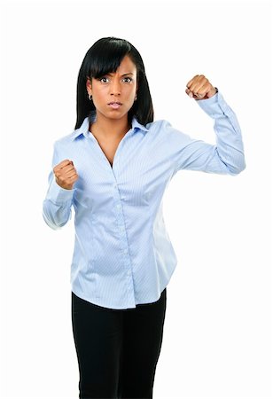 Fighting black woman showing fists isolated on white background Stock Photo - Budget Royalty-Free & Subscription, Code: 400-05695771