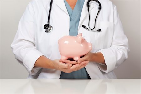 simsearch:400-04758612,k - Female Doctor with Stethoscope Holding Piggy Bank Abstract. Stock Photo - Budget Royalty-Free & Subscription, Code: 400-05696386