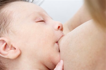 simsearch:400-05697417,k - Mother Breastfeeding Baby Stock Photo - Budget Royalty-Free & Subscription, Code: 400-05697416
