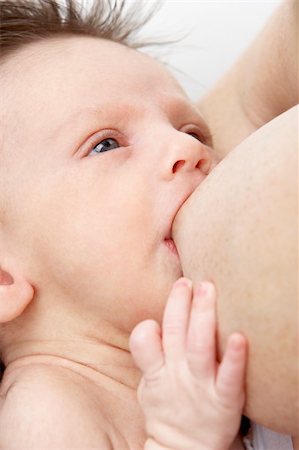 Mother Breastfeeding Baby Stock Photo - Budget Royalty-Free & Subscription, Code: 400-05697417