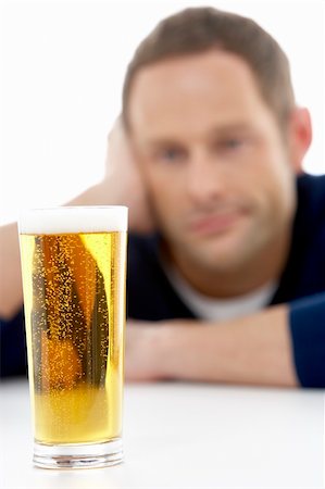 Man Looking At Glass Of Beer Stock Photo - Budget Royalty-Free & Subscription, Code: 400-05697461