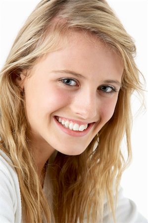 pretty blonde 13 year old girl - Portrait Of Smiling Teenage Girl Foto de stock - Super Valor sin royalties y Suscripción, Código: 400-05697526