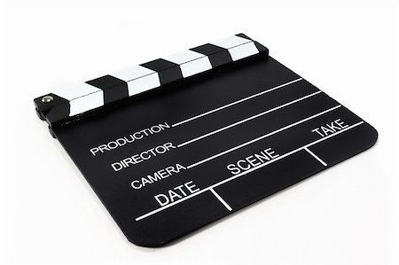 silencefoto (artist) - a black and white film flap on a white background Stockbilder - Microstock & Abonnement, Bildnummer: 400-05699140