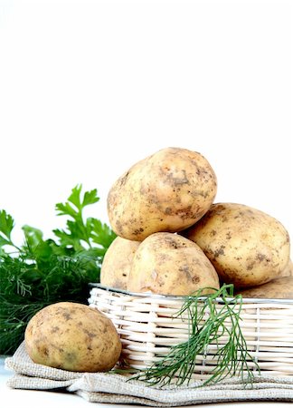 simsearch:400-06701002,k - Basket of fresh organic potatoes Stock Photo - Budget Royalty-Free & Subscription, Code: 400-05699195