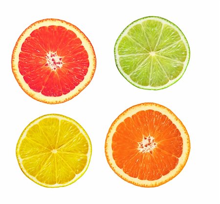 simsearch:400-04293426,k - sliced pink grapefruit, lime, lemon and orange isolated on white Fotografie stock - Microstock e Abbonamento, Codice: 400-05699288