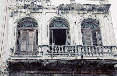 facade of colonial city - Detail of eroded exterior walls from  building in old havana, cuba Stock Photo - Budget Royalty-Free & Subscription, Code: 400-05699378