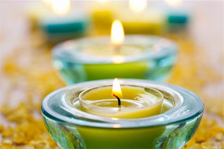 Close-up of blue and yellow candles with yellow bath salt Stock Photo - Budget Royalty-Free & Subscription, Code: 400-05690076