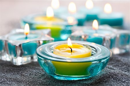 Close-up of blue and yellow Christmas candles on silver sand Stock Photo - Budget Royalty-Free & Subscription, Code: 400-05690073