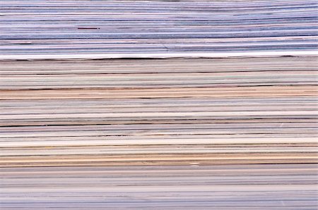 ruigsantos (artist) - Pile of magazines, side view, closeup Stock Photo - Budget Royalty-Free & Subscription, Code: 400-05690335