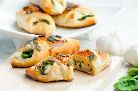 phbcz (artist) - puff pockets filled with spinach and cheese Stockbilder - Microstock & Abonnement, Bildnummer: 400-05690730