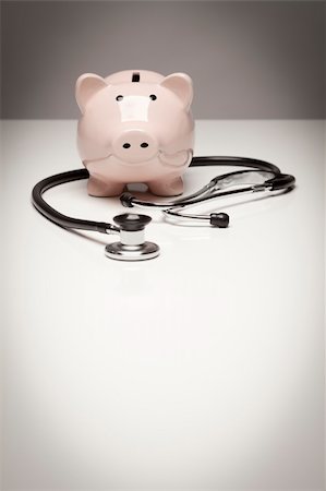 simsearch:400-04758612,k - Piggy Bank and Stethoscope with Selective Focus on a Gradated Background. Stock Photo - Budget Royalty-Free & Subscription, Code: 400-05690884