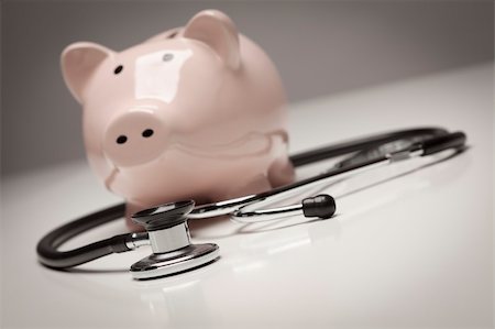 simsearch:400-04758612,k - Piggy Bank and Stethoscope with Selective Focus on a Gradated Background. Stock Photo - Budget Royalty-Free & Subscription, Code: 400-05690886