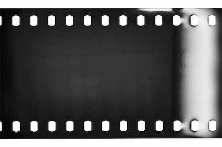 simsearch:400-05691081,k - Blank grained film strip texture Foto de stock - Super Valor sin royalties y Suscripción, Código: 400-05691079