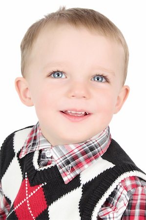 Portrait of a blond toddler boy against white Foto de stock - Super Valor sin royalties y Suscripción, Código: 400-05693279