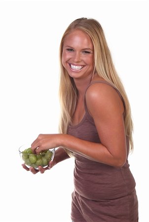 photo of model woman with grapes - Happy Healthy Young Woman Eating Healthy Food Choices Stock Photo - Budget Royalty-Free & Subscription, Code: 400-05693357