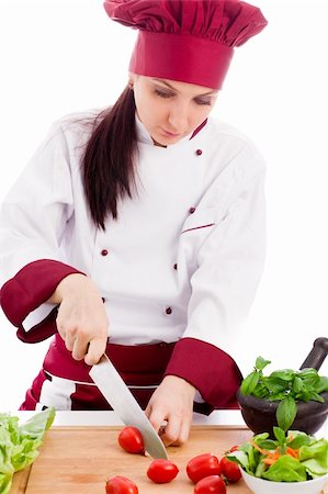 photo of succesfull female restaurant chef on white background Stockbilder - Microstock & Abonnement, Bildnummer: 400-05693434