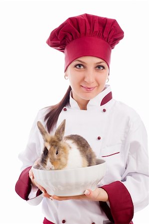 photo of succesfull female restaurant chef with rabbit inside a bowl Foto de stock - Super Valor sin royalties y Suscripción, Código: 400-05693430