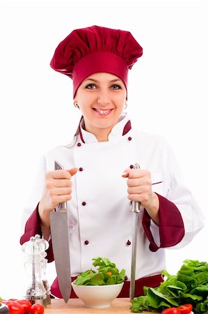photo of succesfull female restaurant chef on white background Foto de stock - Super Valor sin royalties y Suscripción, Código: 400-05693444