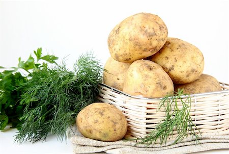 simsearch:400-06701002,k - Basket of fresh organic potatoes Stock Photo - Budget Royalty-Free & Subscription, Code: 400-05693788