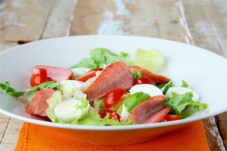 quail dish - salad with quail eggs and salami Stock Photo - Budget Royalty-Free & Subscription, Code: 400-05704040