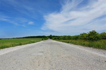 farne islands - Rural paved road among the fields, orchards and forests Photographie de stock - Aubaine LD & Abonnement, Code: 400-05704469