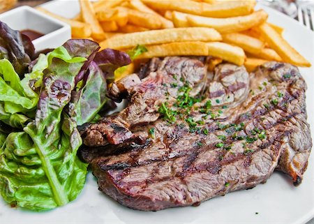 simsearch:400-05664697,k - juicy steak beef meat with french fries Stock Photo - Budget Royalty-Free & Subscription, Code: 400-05704512