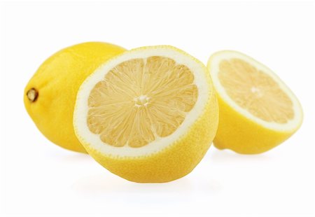 simsearch:400-04423984,k - Fresh lemon with halves isolated on white background Foto de stock - Royalty-Free Super Valor e Assinatura, Número: 400-05704782