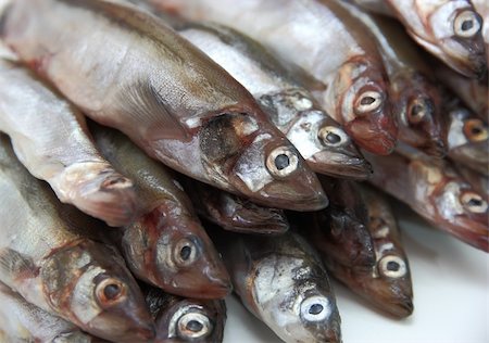 poco appetitoso - Fresh fish sprats Photographie de stock - Aubaine LD & Abonnement, Code: 400-05704854